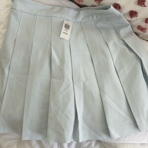 Aritzia baby blue skirt summer

Tennis skirt